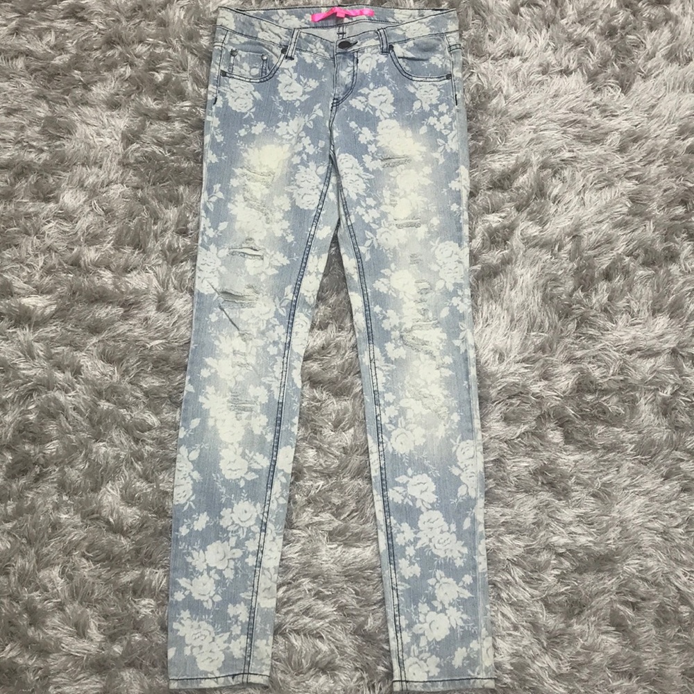 Trendy, ripped floral jeans